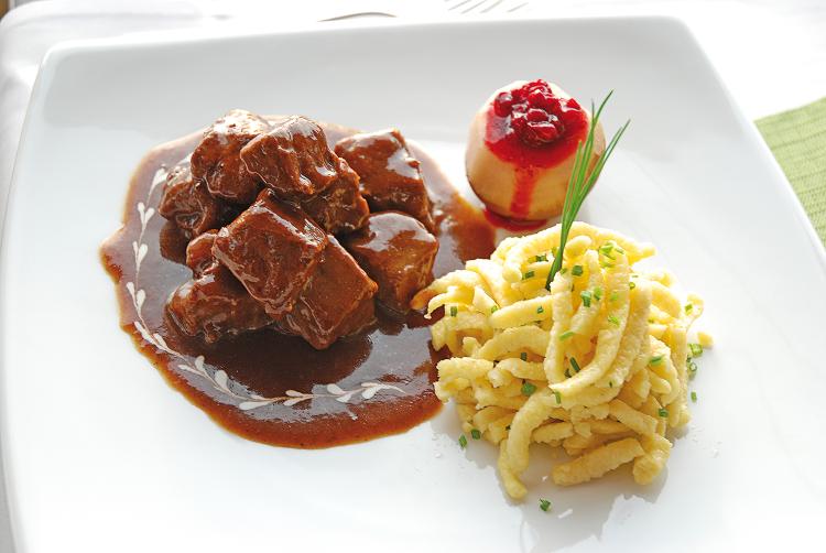 Leolux „Pallone Paradise Rosefinch“ mit „Portobello“-Beistelltisch